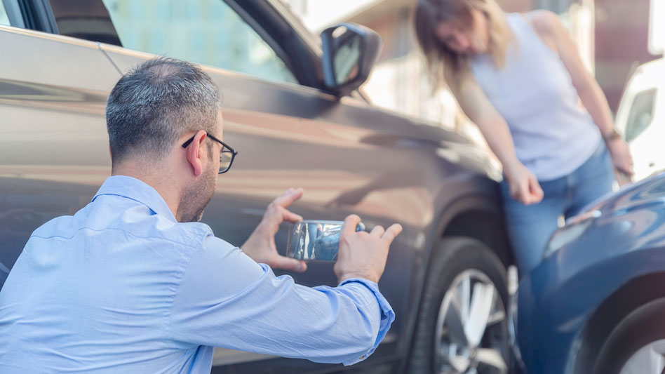 news-taking-intelligent-automation-to-the-next-level_948x533 Man taking photo on phone of car accident