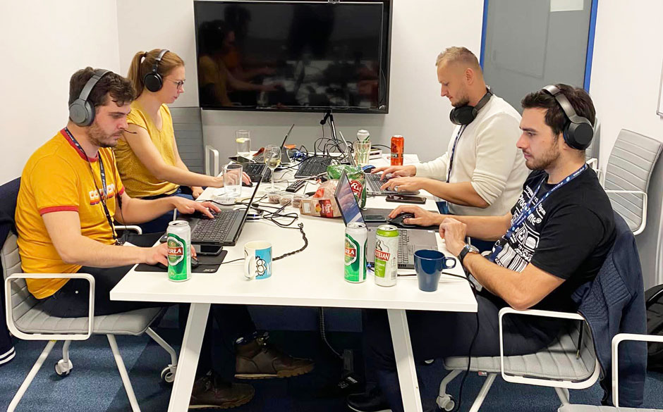 Employees working together at hackathon